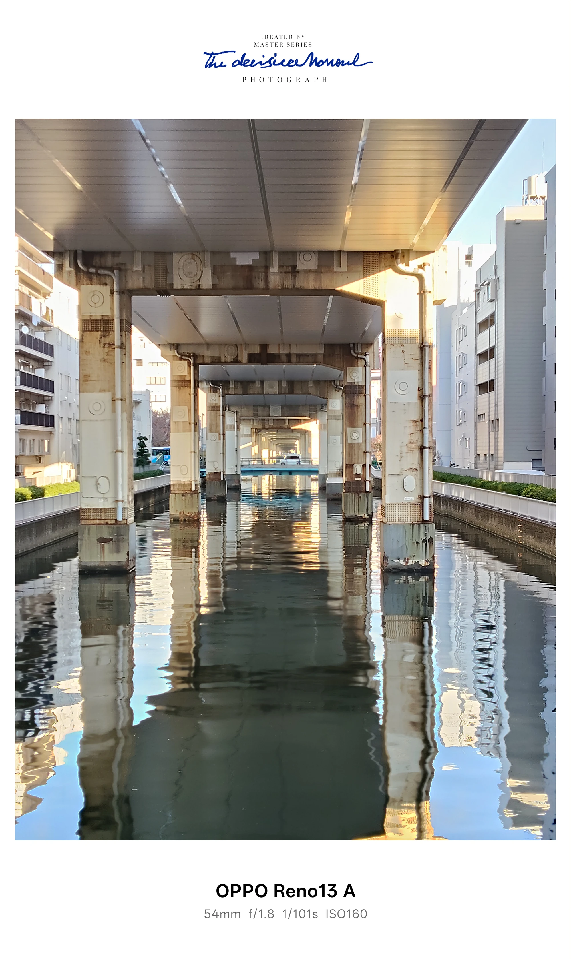OPPO Reno13 Aで撮影した川沿いの高架下。54mm相当の画角で奥行きと水面の反射を捉えたカメラ作例