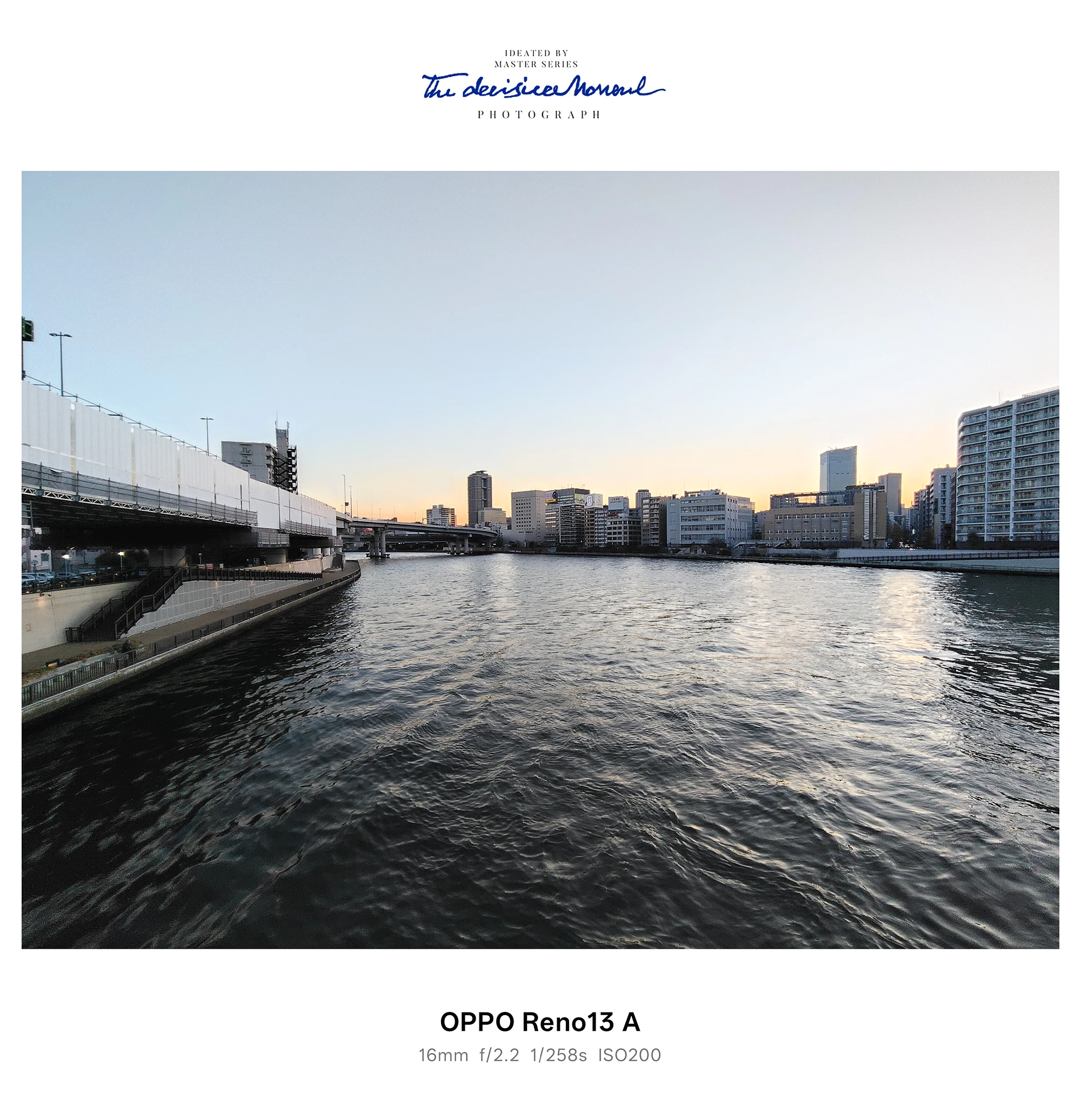 川幅の広い水辺と夕焼けグラデーションの空、遠景のビル群をOPPO Reno13 Aで撮影