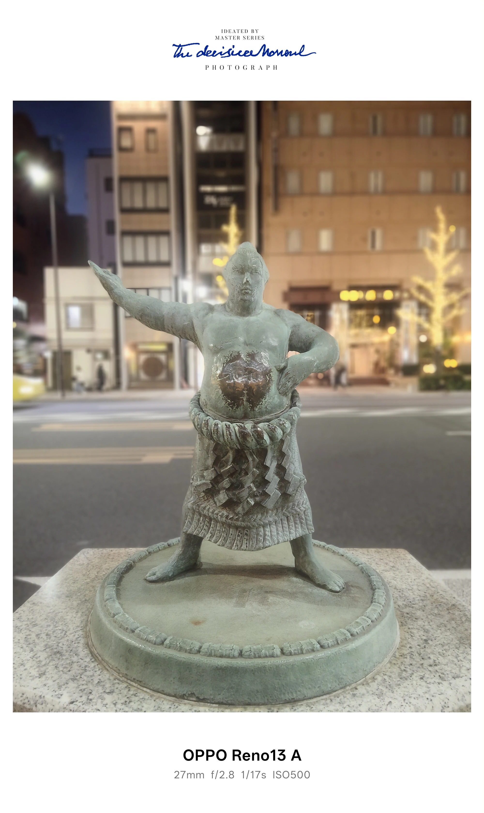 夜景の中で立ち姿の相撲力士像を捉えたOPPO Reno13 Aカメラ作例（背景ボケあり）