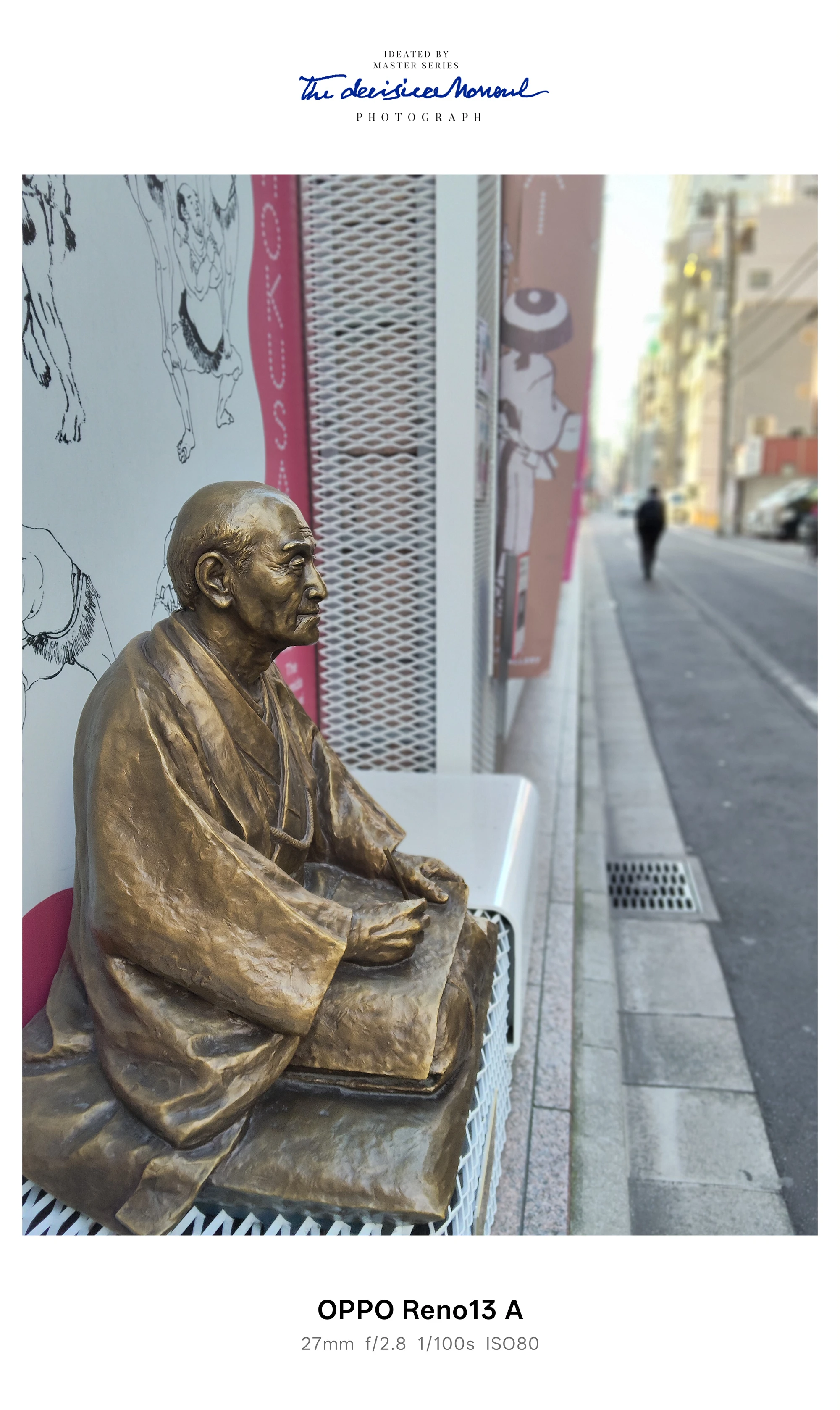 路上に置かれた座禅姿の銅像を背景ボケで撮影したOPPO Reno13 Aカメラ作例